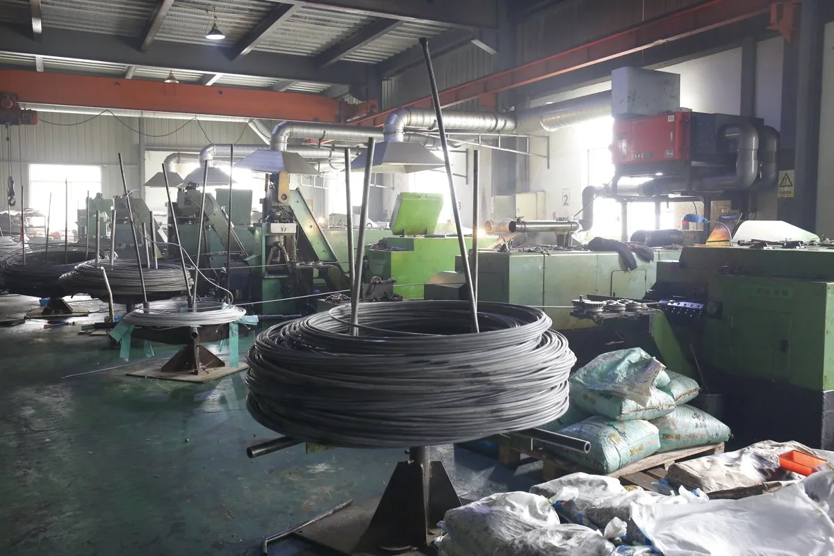 Cold heading machines with steel wire coils