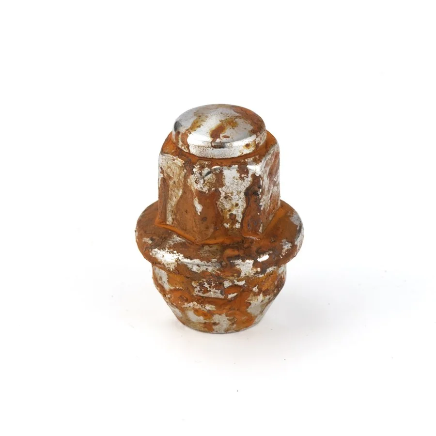 Ordinary chrome-plated lug nut rusted after salt-spray testing