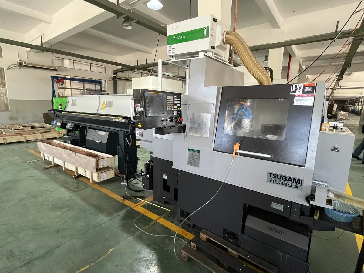Tsugami Swiss-type lathe with bar feeder